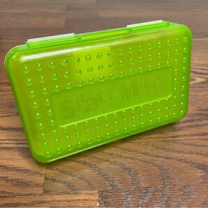 vintage 1990s Spacemaker pencil box in a neon green color